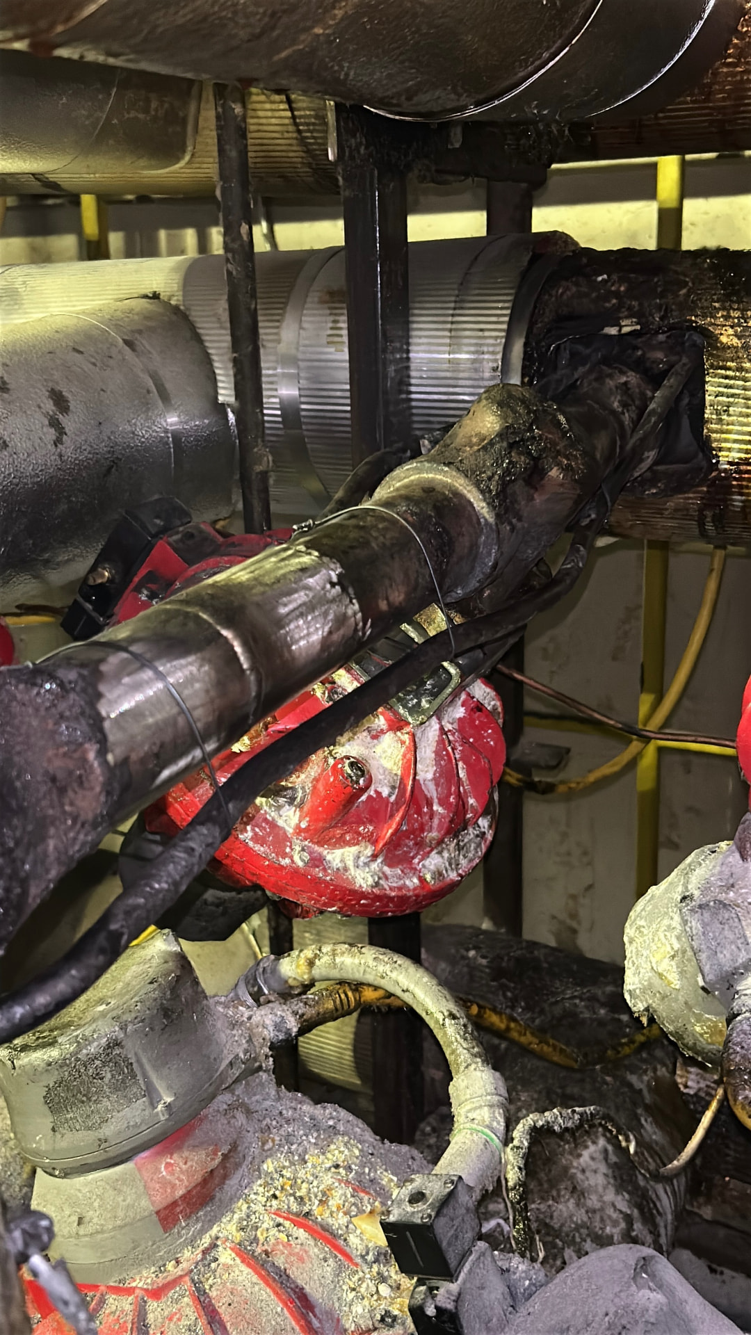 Industrial valve with corroded insulation and steam tracing